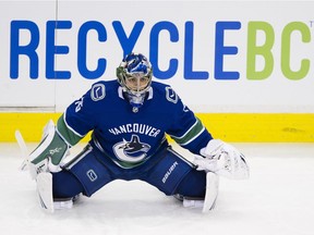 Vancouver Canucks' prospect, goaltender Michael DiPietro, warms up before playing the Calgary Flames at Rogers Arena on Feb. 9.