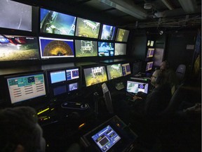 Members of Ocean Networks Canada monitoring data on board the RV Sikuliaq in June, 2016. [PNG Merlin Archive]