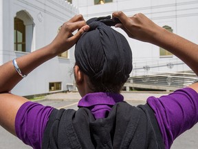 The tiny Sikh community in Clearwater has sold its temple and given the $164,000 they made from the sale to local charities.Narinder Singh Heer, president of Guru Tegh Bahadur Sikh Temple in Clearwater, said the community had shrunk to five families and did not need the space. A Sikh boy ties his turban in this file photo.