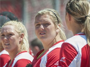 Team Canada's Sara Groenewegen (centre), pictured at Surrey's Softball City in July 2014.