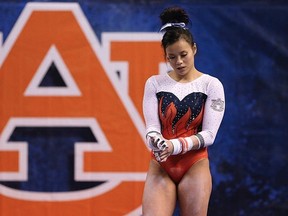 A college gymnast's career came to an abrupt, agonizing end after she broke both her legs and dislocated her knees when attempting a blind landing.