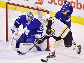 Boston Bruins right wing David Pastrnak (88) shots on Toronto Maple Leafs goaltender Frederik Andersen (31) during third period NHL playoff hockey action in Toronto on Wednesday, April 17, 2019.