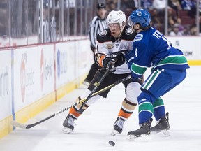 Josh Teves, right, one of the Vancouver Canucks' newest college players, likes the direction the rebuilding NHL team is headed in and likes the culture of the locker-room.