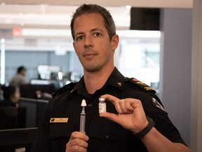 Paramedic Specialist Ryan Stefani holds ketamine, shown here ready to be used as a nose spray. In a recent paramedic trial, used intranasally, the drug reduced patient pain significantly. Photo: Courtesy of BCEHS