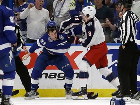 Tampa Bay Lightning centre Brayden Point and Columbus Blue Jackets defenceman Zach Werenski fight during the first period of Game 2 of an NHL Eastern Conference first-round hockey playoff series Friday, April 12, 2019, in Tampa, Fla.