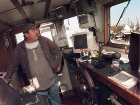 Skipper John 'Phil' Stirling in the wheelhouse of the Western Wind fishing boat docked at Fisherman's Wharf in Steveston in 2000. Since this photo was taken the Western Wind was involved in a major cocaine bust and Stirling alleges he was working for both the Hell's Angels and as a police informant.