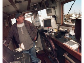 PRV111600_FABFEDTOUR_02 :  SEE CITY STORY BY MICHAEL SMYTH  -- Nov. 16, 2000 -- RICHMOND, B.C. -- Skipper Phil Stirling, 46 in the wheelhouse of his recently purchased 92 foot Western Wind fishing boat docked at Fisherman's Wharf in Steveston Thursday morning. Stirling has weathered all types of storms and owned numerous fishing vessels but now finds himself leaving Canada to make a living in the fishing industry. He plans to rig out the Western Wind as a tuna boat and work the offshore waters west of Mexico. Since this photo was taken the Western Wind was involved in a major cocaine bust and Stirling alleges he was working for both the Hell's Angels and as a police informant. Province staff photo by Ric Ernst. [PNG Merlin Archive]