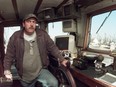 Skipper John (Phil) Stirling in the wheelhouse of the Western Wind in 2000.
