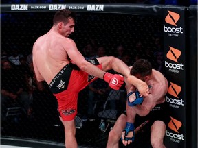 Canada's Rory MacDonald connects with a kick on Jon Fitch during their Bellator welterweight title fight on Saturday, April 27, 2019 in San Jose Calif. MacDonald won by majority draw.