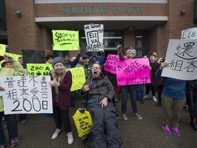 Residents of the nine-storey Solheim Place apartment building in Vancouver protest the lack of action on the part of their landlord, S.U.C.C.E.S.S, to fix broken elevators Saturday, April 13, 2019.