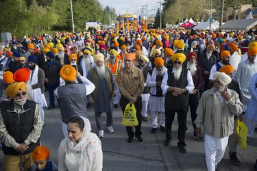 People take part in the annual Vaisakhi parade in Surrey, April 20, 2019. Hundreds of thousands of people attend the Sikh festival every year. Surrey’s Vaisakhi parade is one of the largest outside of India. Photo by Jason Payne/PNG