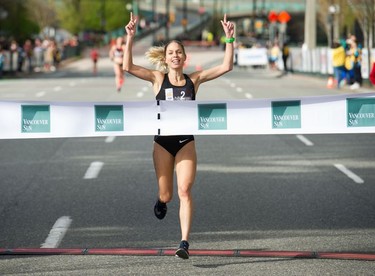 North Vancouver's Natasha Wodak is the first woman to cross the finish line at the annual Vancouver Sun Run in Vancouve on Sunday, April 14, 2019.
