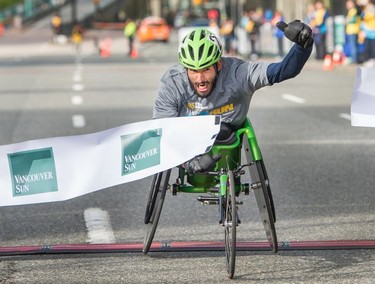 Balraj Zimich of North Vancouver is the first wheelchair athlete to cross the finish line at The Vancouver Sun Run in Vancouver on Sunday, April 14, 2019.