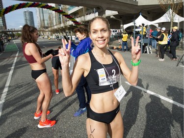 Natasha Wodak of North Vancouver is the first woman to cross the finish line at the 35th annual Vancouver Sun Run on Sunday, April 14, 2019.