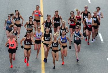 Eventual women's race winner Natasha Wodak (in the No. 2 bib) leads the pack of female competitive racers at the start of the 2019 Sun Run on Georgia Street in downtown Vancouver on Sunday, April 14, 2019.