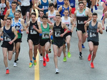 Eventual race winner Justin Kent (centre, in the No. 42 bib) leads the pack early on at the 2019 Vancouver Sun Run in Vancouver on Sunday, April 14, 2019.