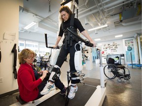 Surrey Liberal MLA and incomplete quadriplegic Stephanie Cadieux is strapped into the Lokomat, a robotic exoskelteon that helps her use her legs, at Neuromotion Physiotherapy Clinic.