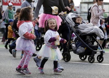 Some very young Vancouver Sun Run participants look pretty pumped up about taking part in the annual event in Vancouver on Sunday, April 14, 2019.