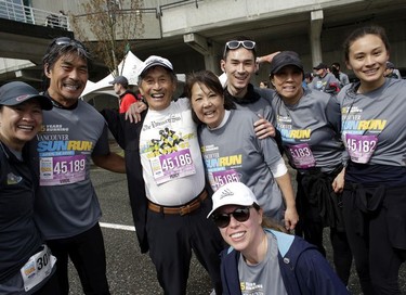 Vancouver Sun Run participants look delighted that their race is over during the 35th annual event in Vancouver on Sunday, April 14, 2019.