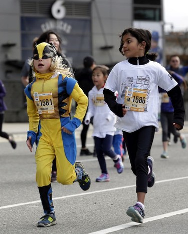 This race looks serious for these Mini Sun Run participants, part of the 35th annual Vancouver Sun Run on Sunday, April 14, 2019.
