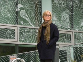 Penny Martyns, manager of green buildings on the UBC campus, at a building with patterned glass intended to reduce bird-collision deaths.