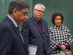 VANCOUVER, BC - APRIL 16, 2019 - Left to right: Sav Dhaliwal, Chair, Metro Vancouver Housing Corp., MP Andrew Vaughan, MP Heddy Fry outside Kelly Court in Vancouver, BC, April 16, 2019. Announcement regarding $1.3 million to repair and upgrade Kelly court for low cost housing for persons with disabilities and their families.  (Arlen Redekop / PNG staff photo) (story by Dan Fumano) [PNG Merlin Archive]