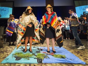 Hon. Jody Wilson-Raybould, M.P., Vancouver Granville, and Hon. Jane Philpott, M.P., Markham-Stouffville are honoured as matriarchs during a ceremony at BC's First Nations Justice Council (FNJC) hosted it's first-ever First Nations Provincial Justice Forum at Westin Wall Centre in Richmond, BC, April 24, 2019.