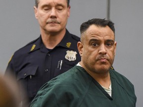 Raymond Rodio lll is arraigned at First District Court, Thursday, April 25, 2019 in Central Islip, N.Y. Rodio pleaded not guilty to sex trafficking and other charges. He allegedly ran a prostitution ring out of his parents Sound Beach home for about four years.