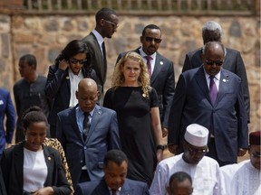 Canada's Gov. Gen. Julie Payette (centre) arrives to lay a wreath at the Kigali Genocide Memorial in Kigali, Rwanda on April 7, 2019. Rwanda is commemorating the 25th anniversary of when the country descended into an orgy of violence in which some 800,000 Tutsis and moderate Hutus were massacred by the majority Hutu population over a 100-day period in what was the worst genocide in recent history.