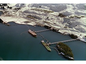 Oil tankers load at the Alaska Oil pipeline terminal in Valdez, Alaska in 1989.