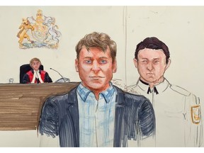 Andrew Berry, centre, appears in B.C. Supreme Court in Vancouver on April 16. A firefighter who arrived at the scene of a double murder in Oak Bay testified Tuesday that Berry said the words, 'Kill me, just kill me.'
