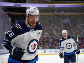 BUFFALO, NY - FEBRUARY 10: Blake Wheeler #26 of the Winnipeg Jets celebrates after scoring the winning goal against the Buffalo Sabres during the third period at KeyBank Center on February 10, 2019 in Buffalo, New York.