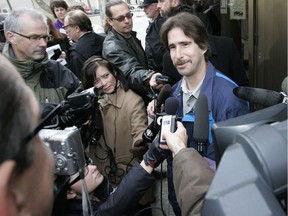 Kyle Unger, pictured talking to reporters outside a Winnipeg courthouse in 2009, was wrongfully convicted and spent 14 years in prison. On Monday he received an out-of-court settlement.
