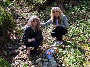 Janie Goodswimmer (left) and her sister Leanne McLean recently visited the place on Burnaby Mountain where their brother Kenneth McArthur's remains were found in 1977.