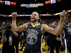 Stephen Curry of the Golden State Warriors celebrates after defeating the Portland Trail Blazers 114-111 in game two of the NBA Western Conference Finals at ORACLE Arena on May 16, 2019 in Oakland, California. NOTE TO USER: User expressly acknowledges and agrees that, by downloading and or using this photograph, User is consenting to the terms and conditions of the Getty Images License Agreement.