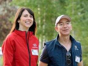 In this file photo, Mackenzie Bezos arrives at the Allen & Co. conference at the Sun Valley Resort on July 10, 2013 in Sun Valley, with her now-ex-husband Jeff Bezos, founder and CEO of Amazon