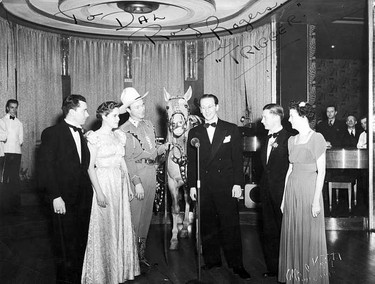 In 1940, while performing in the Panorama Roof ballroom of Hotel Vancouver, Dal Richards (in front of the microphone) had a surprise visit from Roy Rogers and his sidekick Trigger the horse.