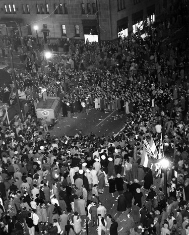 The first Grey Cup game was held in Vancouver on Nov. 26, 1955. The night before, 200,000 people attended the Grey Cup parade, and afterwards, on Georgia Street near the Hotel Vancouver, a mob of 50,000 "hoodlum-gangs spoiled the fun." The Vancouver Sun reported that "exploding smoke bombs and other hoodlum stunts created a dangerous situation as the densely–packed mob surged out of control."