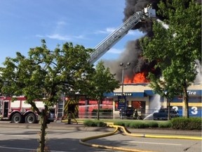 A fire at a Fountain Tire in Surrey has closed a section of Fraser Highway in Surrey on Sunday morning.