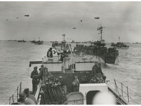 Landing craft of the Royal Canadian Navy take soldiers and equipment from the Third Canadian Division to Juno Beach on D-Day, June 6, 1944. The Canadians would storm the beach at 8:05 a.m.