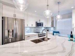 This kitchen, designed by Pam Chilton, principal at Zimba Design, shows the positive impact a renovated kitchen can have on home's value.  Photo credit: Fyfe Photography  [PNG Merlin Archive]