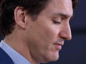 In this file photo taken on March 07, 2019 Canadian Prime Minister Justin Trudeau speaks to the media at the national press gallery regarding the SNC-Lavalin affair in Ottawa, Ontario.