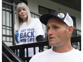 Chris Middleton, right, talks about the benefits of the "Got Your Back for Life" buddy-check program designed by Christine Harris, left.