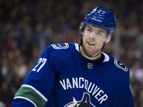 en Hutton on the ice during a break in play against the Arizona Coyotes in a regular season NHL hockey game at Rogers Arena. Photo: Gerry Kahrmann, Postmedia