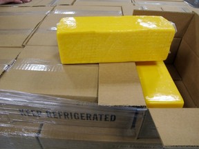 In this photo provided by the Canada Border Services Agency, officials seized 3,990 kilograms of undeclared cheese at the Thousand Islands border crossing on Jan 10, 2018. The driver was charged with a $30,000 fine.