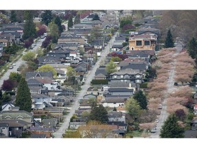 Homes are pictured at Vancouver in April. Canada’s mortgage market still depends heavily on 'mortgage-backed securities,' a type of financial product that caused the financial crisis to spread from the U.S. to the rest of the world.