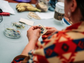 Participants take part in a porcupine quilling workshop at the Indigenous Arts Conference in Ottawa in this March 2019 handout photo.