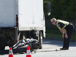 Vancouver police investigate an accident involving a truck and a motorcycle that shut down the intersection at 4th Avenue and Blanca Street on May 23, 2019.