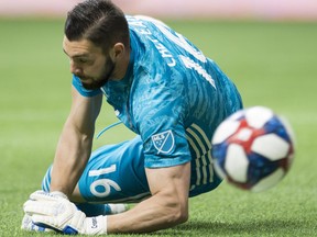 Vancouver Whitecaps goalkeeper Maxime Crepeau (16) makes a save during the second half of MLS soccer action against the Atlanta United, in Vancouver, B.C., Wednesday, May, 15, 2019.