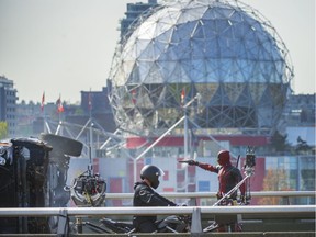 Fans of the Vancouver-filmed Deadpool franchise can now place their bids on some of the quirkiest props from the film, which was filmed here in Vancouver. The cast of Deadpool is pictured in this 2015 file photo filming a scene on the Georgia Street Viaduct in Vancouver, B.C.